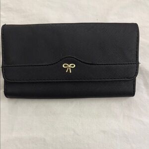 Elegant Black Clutch with Gold Accent